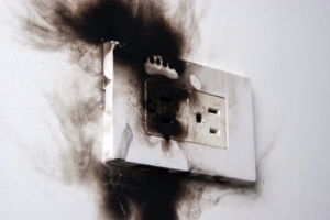 scorched outlet with smoke